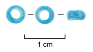 PRL-1036 - Perle annulaireverrePetite perle annulaire en verre bleu translucide.