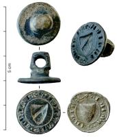 SIG-7018 - Matrice de sceaubronzeMatrice de sceau circulaire, à poignée perforée, comportant en général, des armes, entourées d'une légende en lettres gothiques: S[igillum]....etc