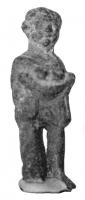 STE-4169 - Statuette : enfant - offrant (?)bronzeEnfant debout, joufflu, apparemment vêtu d'une seule chlamyde courte jetée sur les épaules, et s'arrêtant en haut des jambes. Il présente devant lui une sorte de coupe, en forme de barque, contenant deux offrandes (fruits ou gâteaux).