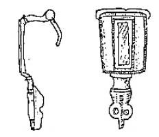 FIB-41434 - Fibule émailléebronzeArc en forme de plaque rectangulaire (parfois avec une série de petits ergots sur les côtés), avec une loge d'émail au centre, encadrée de deux lignes ondées ou guillochées; pied en tête de reptile.