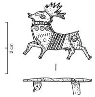 FIB-4187 - Fibule zoomorphe : cerfbronzeFibule en forme de cerf marchant à gauche, les 4 pattes figurées, le corps barré de traits transversaux ; pastilles d'émail sur l'avant et l'arrière-train.