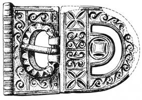 PLB-4022 - Plaque-boucle à décor excisébronzePlaque-boucle à décor excisé de forme allongée, arrondie vers l'arrière (et ajoutée d'un arc de cercle) et rectangulaire à l'avant : la boucle, à extrémités zoomorphes affrontées, est inscrite dans un ajour. Décor excisé couvrant, de type géométrique, organisé autour d'un motif en demi-cercle dans la partie en couronne.