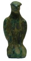 STE-4176 - Statuette zoomorphe : aigle aux ailes repliéesbronzeStatuette en bronze présentant un aigle debout, les ailes au repos repliées le long du corps. 