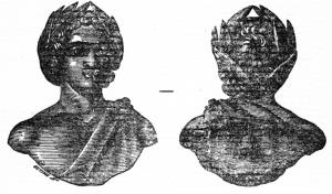 APM-4098 - Applique : buste lauré (Geta ?)bronzeApplique en forme de buste juvénile aux traits idéalisés, lauré (empereur ; peut-être Geta ?). Revers creux, avec les restes d'un piton de fixation centré