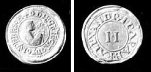 BUL-9051 - Bulle pontificaleplombDisque épais en plomb, perforé pour le passage de rubans, et frappé au nom du pape émetteur : sur une face, le buste papal accompagné de la legende autour : legende illisible ; au revers : ALEXANDRI PAPA ; au centre : II (Alexandre II, pape de 1061 à 1073).