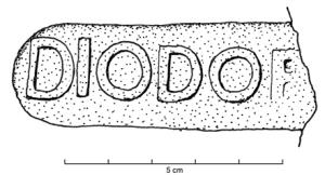 COV-4373 - Tuile estampillée DIODORIterre cuiteTuile estampillée DIODORI, dans un cartouche allongé aux petits côtés arrondis.
