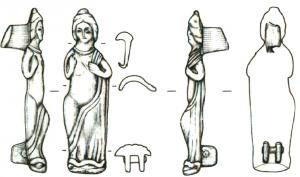 FIB-41664 - Fibule anthropomorphebronzeFibule en forme de personnage féminin (Venus pudica ?)dont la robe glisse en découvrant le torse et une jambe; les mains couvrent les seins.