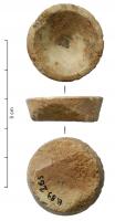 PFA-4002 - GodetosGodet bas, de forme tronconique, creusée sur une face d'une dépression conique; les parois sont obliques, le fond plat.