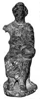 STE-4154 - Statuette : femmebronzeStatuette en bronze : déesse assise vêtue d'un long chiton arrivant à mi-mollets, la main droite allongée sur la jambe tend une patère.