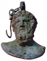 CUB-4101 - Curseur de balance en forme de bustebronzeCurseur de balance en bronze (parfois rempli partiellement de plomb), en forme de buste humain : thème mythologique.