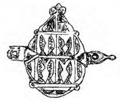 IND-5004 - Fermoir (?)bronzeTessère (?) resctangulaire en plomb, présentant sur les deux faces des motifs géométriques et des inscriptions en caractères coufiques.