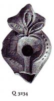 LMP-6053 - Lampe byzantine Palmette terre cuiteLampe à bec long à canal; corps massif; anse plastique en forme de palmette à trois feuilles. Médaillon vierge; épaule ornée de points en relief.