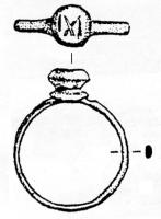 BAG-5050 - Bague à chaton circulaire et monogrammebronzeBague coulée, le chaton se détache nettement, de forme circulaire sur une base creusée d'une moulure; il porte des lettres pouvant former un monogramme.
