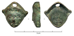 CLD-4037 - Clou décoratif : tête d'AttisbronzeClou décoratif coulé avec sa pointe de fixation, représentant une tête au visage juvénile, coiffée d'un bonnet conique (Attis ?).