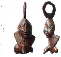 AMP-4014 - Amulette phalliquebronzeTPQ : 1 - TAQ : 300Amulette représentant des parties génitales masculines au repos ; au-dessus du pubis, dont les mèches sont précisées, apparaît une tête de Nubien chauve ; anneau transversal également coulé.