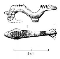 FIB-4319 - Fibule zoomorphe : dauphinbronzePoisson au corps sinusoïde en profil, le sommet de la tête barré de profiondes incisions transversales.