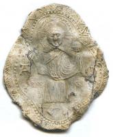 ESP-7031 - Enseigne de pèlerinage : Christ Sauveur d'OrvietoplombEnseigne de pèlerine dans un quadrilobe ovalaire : Christ en majesté, monogramme AT sur le côté.