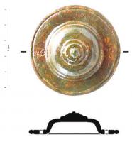 MRS-9009 - Applique latérale de morsbronzeDisque estampé en tôle, evec une bordure en disque plat et au centre une succession de moulures lisses, sommet percé avec trace de fer.