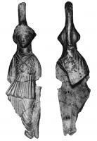 STE-4116 - Statuette : Minerve deboutterre cuiteLa déesse est représentée debout, coiffée d'un casque à haut cimier, portant l'égide sur un chiton marqué d'un pli retombant sur la taille; un bouclier est posé à gauche près de la jambe.