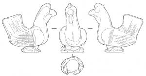 STE-4406 - Statuette zoomorphe : coqterre cuiteFigurine moulée, creuse, en deux valves formant un coq en ronde-bosse : debout, la queue redressée et les plumes indiquées par des alignements de chevrons.