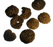 BCN-4013 - Bouchon d'amphore
bois
Bouchon circulaire en liège avec une perforation centrale.