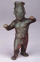 BLS-4027 - Balsamaire en forme de nain lutteur
bronze
TPQ : 100 - TAQ : 200
Le nain, nu, porte derrière la tête la mèche caractéristique (cirrus) des lutteurs professionnels. Il est figuré en pleine action, sans doute en train de pratiquer le pancrace.