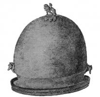 CSQ-2005 - Casque de type Negau, variante étrusque
bronze
Casque de type Negau (ribre en forme de bonnet, creusé à la base d'une large bande creuse faisant le tour du crâne), avec des appliques moulées, rapportés au sommet du timbre et sur les côtés.