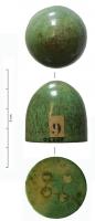 IND-4163 - Pion de jeu ?
os
Objet cylindrique, formant au sommet un dôme élevé; la base plane a été percée de 4 trous  comblé