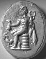 INT-4069 - Intaille : Mercure assis
pierre dure
Intaille figurant Mercure assis sur un rocher, tenant bourse et caducée ; chlamyde ; un coq à ses pieds.