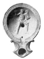 LMP-4033 - Lampe Loeschcke I : Gladiateur
terre cuite
TPQ : 1 - TAQ : 100
Lampe à un bec triangulaire à volutes latérales; disque décoré d'un gladiateur à droite.
