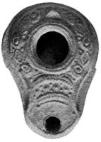 LMP-4146 - Lampe syro-palestinienne (type tardif)
terre cuite
TPQ : 200 - TAQ : 350
Lampe de forme ovoidale avec large bec. Epaule  richement décorée de motifs géométriques.