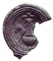 LMP-4743 - Lampe Loeschcke IV : Moulin
terre cuite
TPQ : 50 - TAQ : 100
Lampe ronde à large bec en ogive à volutes (perdu). Médaillon décoré d'un moulin à cheval.