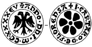 PDS-6002 - Poids de ville : FleurancebronzeTPQ : 1240 - TAQ : 1250Poids de ville, aux armes de Fleurance (Gers) : d'argent à l'aigle bicéphale éployée de sable, fleur au revers. Autour, légendes +ANNO.DNI.M.CC.XXXXEV et la valeur en livres, ou divisions, par exemple  : I.CARTARO.DE.FLORENSA.