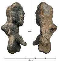 APM-4002 - Applique : grotesque sur phallusbronzeApplique en ronde-bosse, arrière fruste pourvu d'un tenon de fixation de section rectangulaire (7 x 4 mm) ; elle représente des parties génitales masculines surmontées d'une tête d'homme barbu.