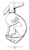 FIB-4322 - Fibule zoomorphe : chienbronzeChien assis à gauche, la tête retournée vers la droite, de type lévrier (museau allongé, grandes oreilles).