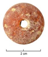 PRL-3560 - Perle annulaire massiveambrePerle annulaire massive (D. section < D. perforation) en ambre de section lenticulaire, dont la perforation est de très petit diamètre (3-4 mm)
