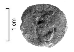 TES-4071 - Tessère monétiforme : crucheplombTessère circulaire, plate, comportant sur une face un motif moulé : cruche, anse à gauche légèrement surélevée.