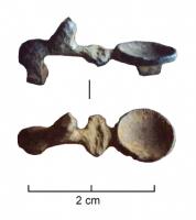 FIB-41067 - Fibule léontomorphebronzeFibule à arc figurant un lion stylisé, les pattes anterieures posées sur un cartouche transversal qui le sépare d'un pied en forme de disque à surface concave.