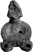 LMP-41882 - Lampe à deux becs : Sarapis, Isisterre cuiteTPQ : 1 - TAQ : 250Lampe à deux becs, encadrés de volutes; sur le médaillon, buste couronné de Sarapis, tourné vers la gauche : sur le réflecteur, bustes d'Isis et Sarapis enlacés, émergeant d'un fleuron.