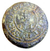 PDS-9105 - Poids monétairebronzePoids circulaire, avec relief et légende moulée sur une face, en caractères gothiques : [à déchiffrer]