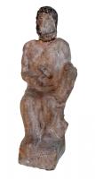 STE-4430 - Statuette : Vulcainterre cuiteLe dieu-forgeron sous la forme d'un homme d'êâge mûr, barbu, les cheveux frisé, assis et tenant un marteau dans la main droite.