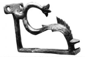 ACH-4036 - Applique de char, renfort d'anglebronzeOrnement de char associé à la structure en bois de la caisse.