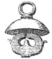 AJG-4026 - Anneau de jougbronzeAnneau massif  posé sur une moulure et une large collerette, elle-même soutenue par 2 volutes en S accolées par le pied et se rejoignant en une forte tige de fer de section carrée, effilée à la pointe.