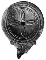 LMP-41140 - Lampe Loeschcke IV : Rosette terre cuiteLampe ronde à bec en ogive à volutes. Médaillon orné d'une rosette à 4 pétales.
