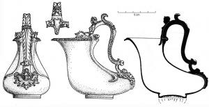 ASK-4001 - Askos Tassinari Z.1000bronzeVase en forme d'outre, à panse déformée latéralment; l'ouverture est déportée vers l'avant et l'anse toujours très décorée, surélevée, prenant appui sur la lèvre et sur le bas de la panse ; fond orné de cercles au tour. Objets toujours de très bonne facture, mais plus ou moins ornés.