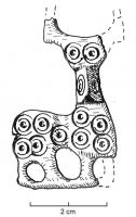 FIB-4349 - Fibule zoomorphe : bouquetinbronzeFibule plate, représentant un bouquetin de profil à droite, la tête de face, le tout très stylisé, corps couvert de cercles oculés ; les 4 pattes sont figurées.