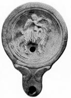 LMP-4124 - Lampe Loeschcke IV : Eros sur boucterre cuiteLampe à bec à volutes. Médaillon décoré d'un Eros chevauchant un bouc, à droite.