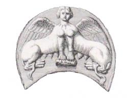 PHA-4016 - Phalère : double sphynxbronze, argentPhalère circulaire encochée d'un arc de cercle à la bse; double sphynx affrontés.