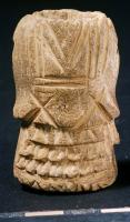 POU-4007 - Poupée articulée (?)osObjet taillé dans une diaphyse d'os long de ruminant, et figurant un torse humain habillé; tête, bras et jambes pouvaient être rapportés, mais rien n'indique de quelle manière.