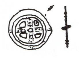 RUL-4018 - Rouelle : Type P2bplombRouelle en plomb dont le damiètre est compris entre 12 et 22mm. 4 rayons. De conception grossière. Le moyeu est marqué par un globule. La jante est ornée d'une cannelure, elle est de section aplatie. Les rayons sont lissent mais peuvent être orné de globules.